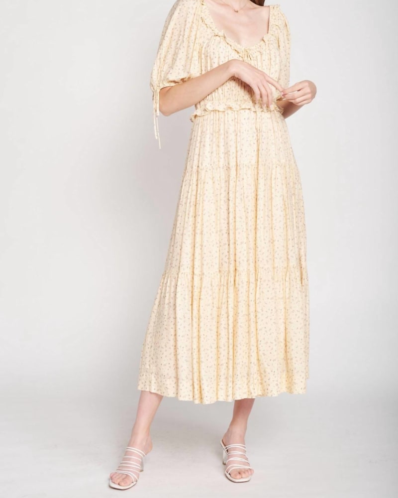 Front of a model wearing a size Large Maci Midi Dress in Yellow in Yellow by En Saison. | dia_product_style_image_id:335081